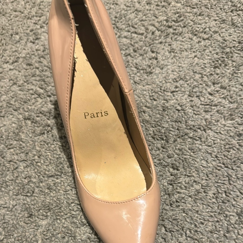 Red bottom! Worn a couple times.